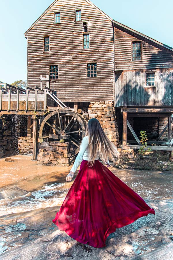Yate Mills Instagram Spot with women wearing white top and long red skirt.